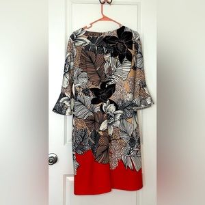 Dress with decorative sleeves